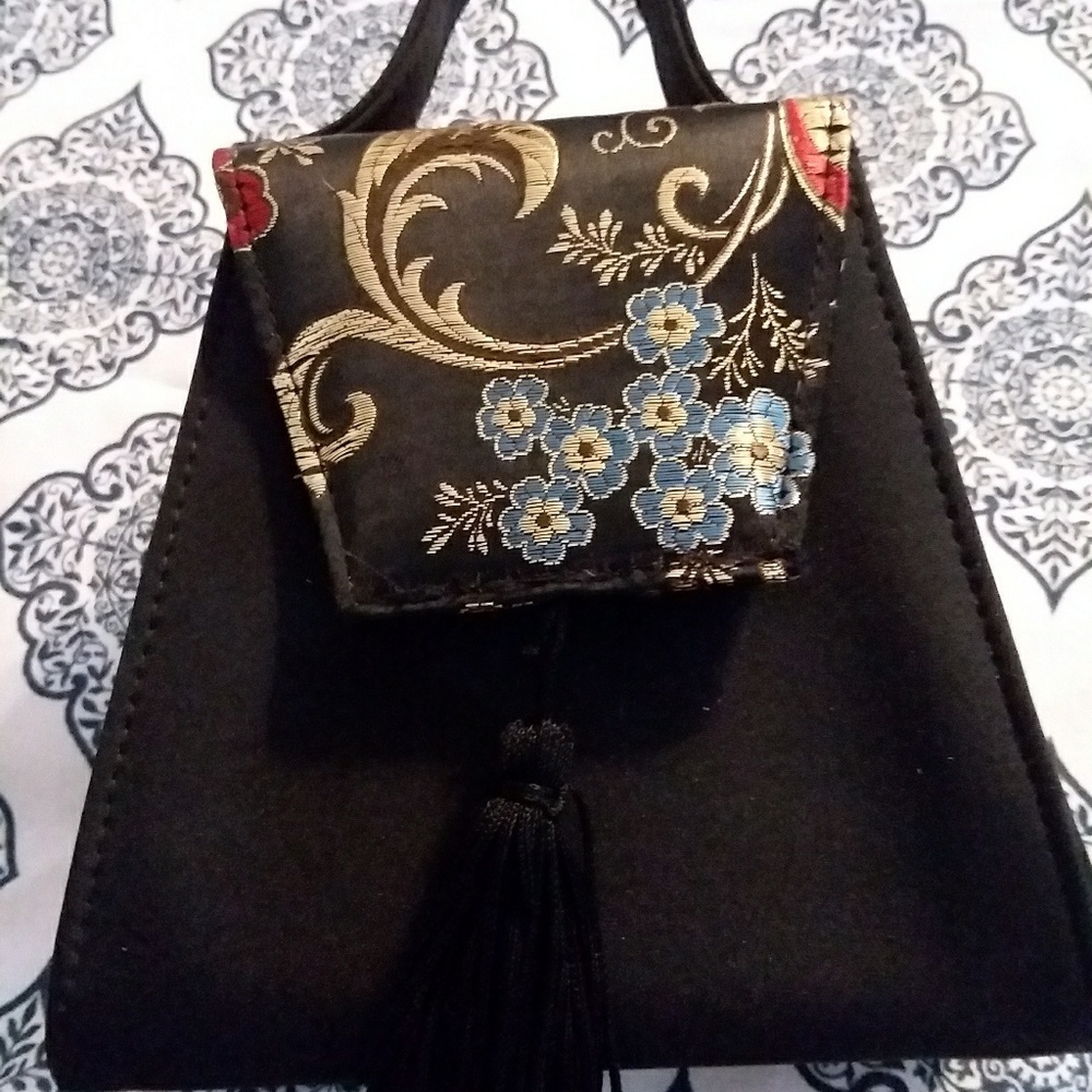 A mini bag with tassel